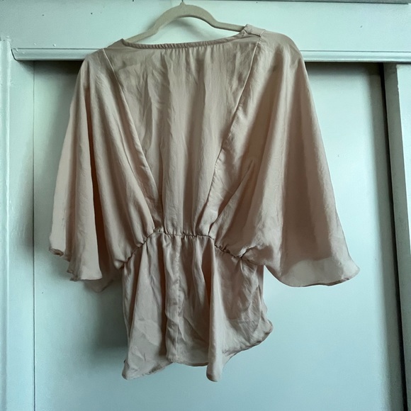 Silky Peach Peplum Blouse - Picture 2 of 4